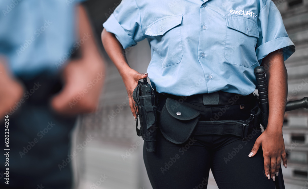 Hand, gun and security with a guard on duty or patrol in the city for safety and law enforcement. Police, service and armed response with an officer outdoor in an urban town for crime prevention Hand, gun and security with a guard on duty or patrol in the city for safety and law enforcement. Police, service and armed response with an officer outdoor in an urban town for crime prevention
