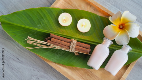 Fototapeta Naklejka Na Ścianę i Meble -  Closeup of Spa accessories,Beautiful composition of spa , spa relax concept, herbs for massage, beautiful sap set on wood table,For marketing products