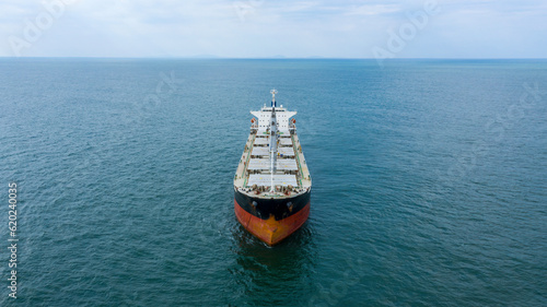 Self-unloading bulk carrier at Rio De La Plata anchorage. Aerial front view. photo