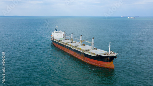 Self-unloading bulk carrier at Rio De La Plata anchorage. Aerial front view.