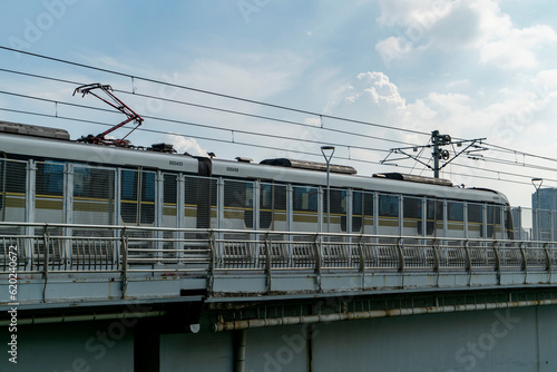 The train is traveling at high speed on the bridge.Chinese translation: Egongyan Rail Bridge photo