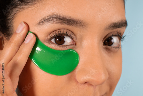 Crop female with patch under eye photo