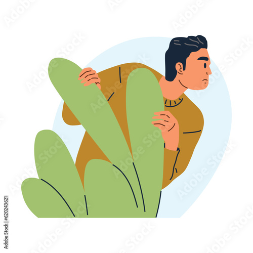 Man spying, peeping from shrub. Person hiding behind bush, sneaking, peeking, watching, looking nosy and waiting. Searching, observing, man secretly regard. Espionage, detective or secret observer