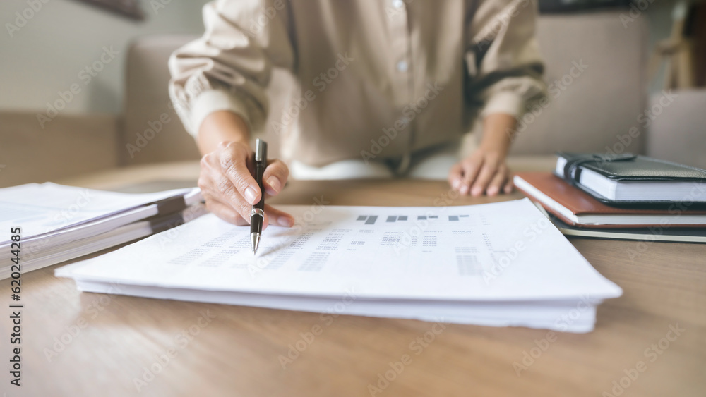 Image of woman calculate tax invoice at home, summarizing taxes, money planing.. Image of woman calculate tax invoice at home, summarizing taxes, money planing..