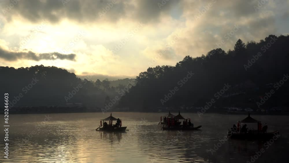 ban ruk thai Yunnan village of Thailand, mae hong son province chinese boat in morning golden sunrise lake with fog ban ruk thai Yunnan village of Thailand, mae hong son province chinese boat in morning golden sunrise lake with fog