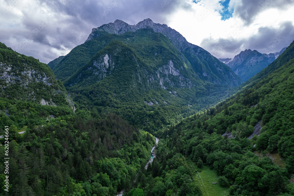 Alpine landscape with green forest in Predil Pass, Italy. Aerial drone view Alpine landscape with green forest in Predil Pass, Italy. Aerial drone view