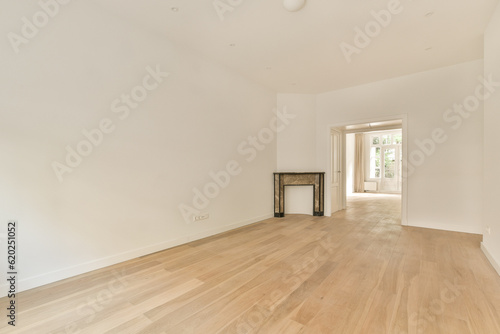 an empty living room with wood flooring and white walls in the room is very clean, but there is no furniture