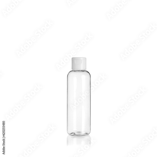 Transparent rounded cylindrical PET bottle container with orange spray pump on white background. Packaging of antiseptic. Template of a bottle for cosmetics and medical products.