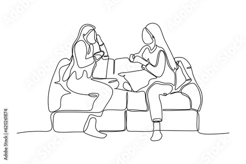 continuous line vector illustration design of two women sitting on sofa