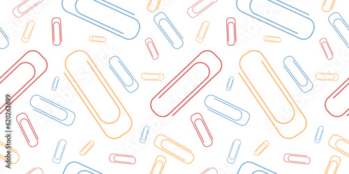 Vector Colorful Paper Clip Seamless Pattern Isolated on White Background. Office or School Supplies Texture. Perfect for office or school themes, wrapping paper, poster and banner, textile