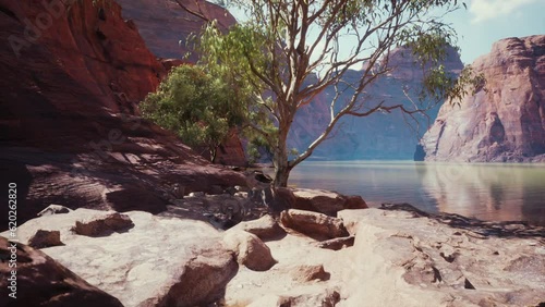 landscape with red sandstone rock and river photo