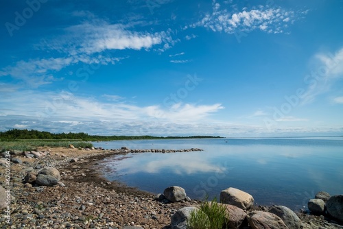 The rocky shore of the Baltic Sea. Beautiful sunny summer day  calm sea. Baltic Sea Estonia Kihnu Island
