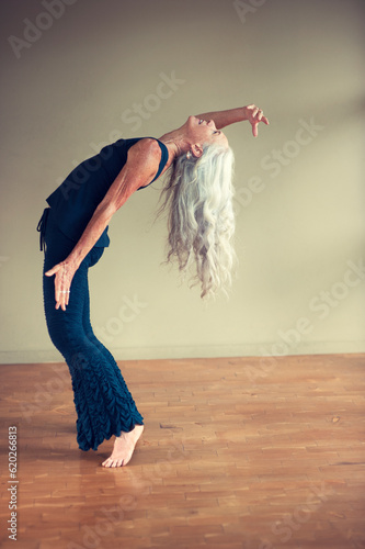 Mindful movement senior woman. 