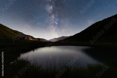 Milky Way over the alpine pond of Pozza Blu, Macolini, Madesimo, Valle Spluga, Valtellina, Lombardy photo
