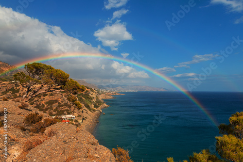 Beautiful landscape. Coast of the island of Crete - Greece area of Lerapetra Eden Rock. Beautiful sky at sunrise over the sea. photo