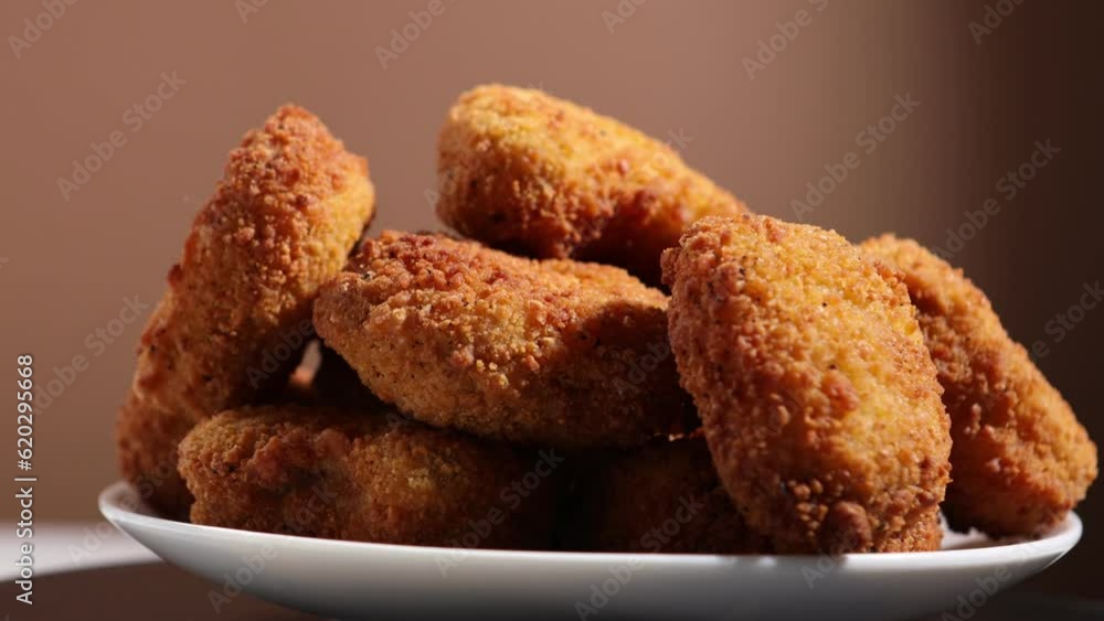 rotation of chicken nuggets with spice rotation of chicken nuggets with spice