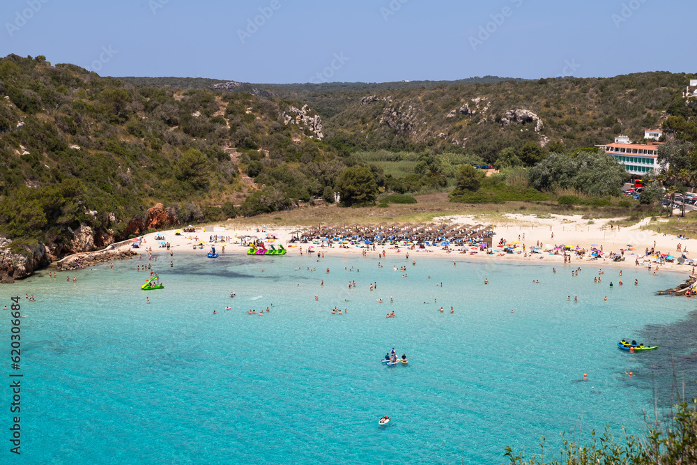 Beach of the village of Cala en Porter on the Spanish island of Menorca.