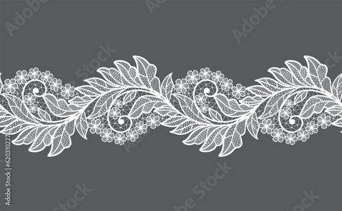 Seamless floral background with white lace leaves.Vector white lace branches with flowers