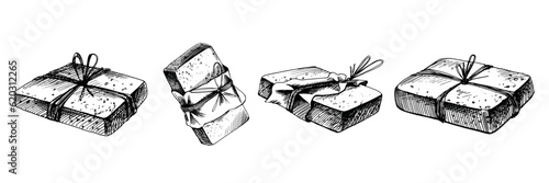 Bars of handmade soap wrapped in kraft paper and jute rope. The illustration is hand drawn in black ink, graphics. eps vector. Set of isolated objects on white background.