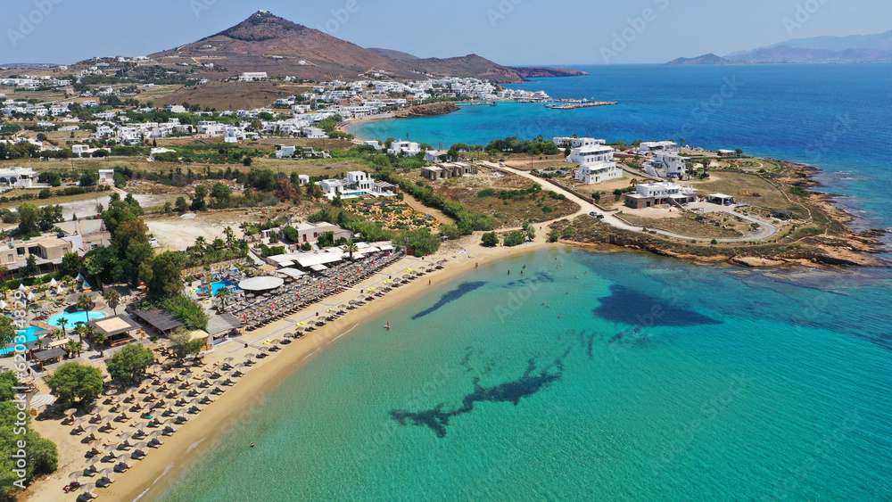 Aerial drone photo of famous organised beach of Punda with crystal clear turquoise sea, Paros island, Cyclades, Greece