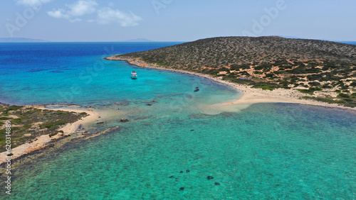 Aerial drone photo of azure paradise blue lagoon of Panteronisi a small islet complex between Paros and Antiparos islands, Cyclades, Greece