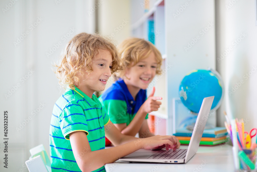 Online remote learning. School kids with computer. Online remote learning. School kids with computer.