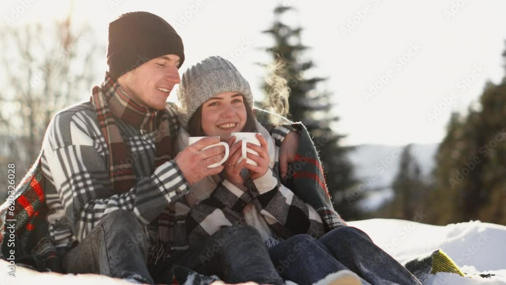 A captivating shot capturing magic and romance winter, when couple experiences unforgettable moments together. Cheerful couple with cup warming drink in hand and winter landscape . Rest and relaxation A captivating shot capturing magic and romance winter, when couple experiences unforgettable moments together. Cheerful couple with cup warming drink in hand and winter landscape . Rest and relaxation