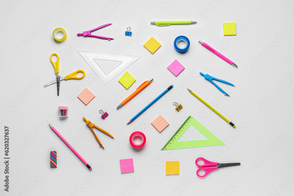 Composition with different stationery on light background Composition with different stationery on light background
