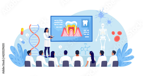 Medical conference and dentists education. Students dentist study research in stomatology science. Doctor giving speech on medicine seminar from tribune for audience. Meeting room for medics workshop