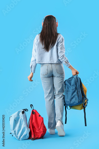 Female student in headphone...