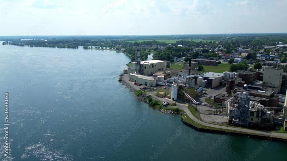 Electric Hydro Power Plant Facility Aerial Drone next to Water Lake River in Ontario, Canada Electric Hydro Power Plant Facility Aerial Drone next to Water Lake River in Ontario, Canada