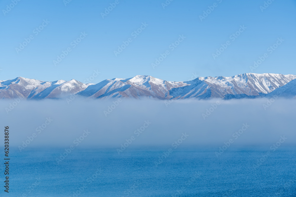 Omarama, Central Otago, New Zealand 
Mountains, Lake, Low Cloud and Blue sky 