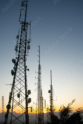 фотографія radio and television telecommunication antenna towers with satellite dishes at s
