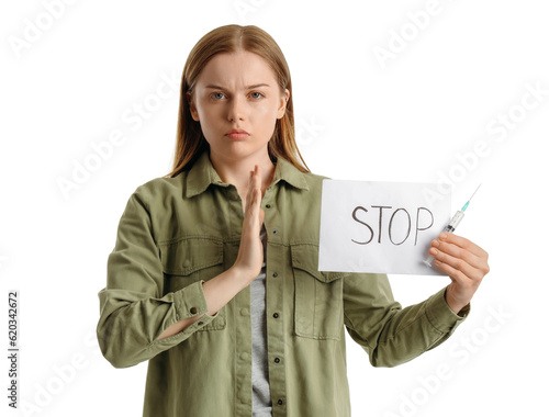 Young female junkie holding...