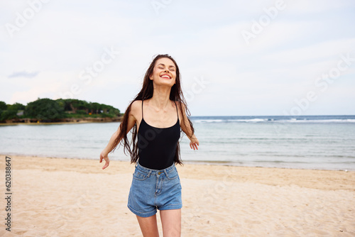 woman smile running lifestyle beach sunset summer travel young sea girl