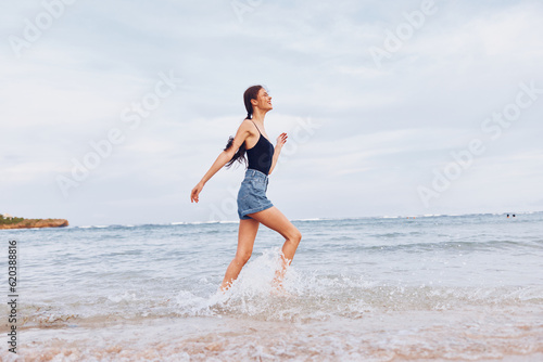 wave woman sea smile sunset running beach lifestyle young travel summer
