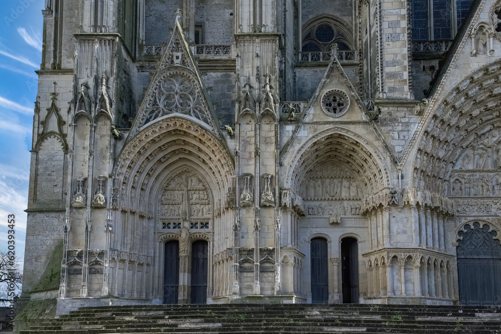 Bourges, medieval city in France, the Saint-Etienne cathedral, main entry with saints statues
