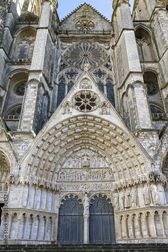 Bourges, medieval city in France, the Saint-Etienne cathedral, main entry with saints statues 