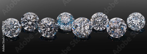 Precious stones diamond moissanite cubic zirconia hand-cut on a black background isolated with reflection