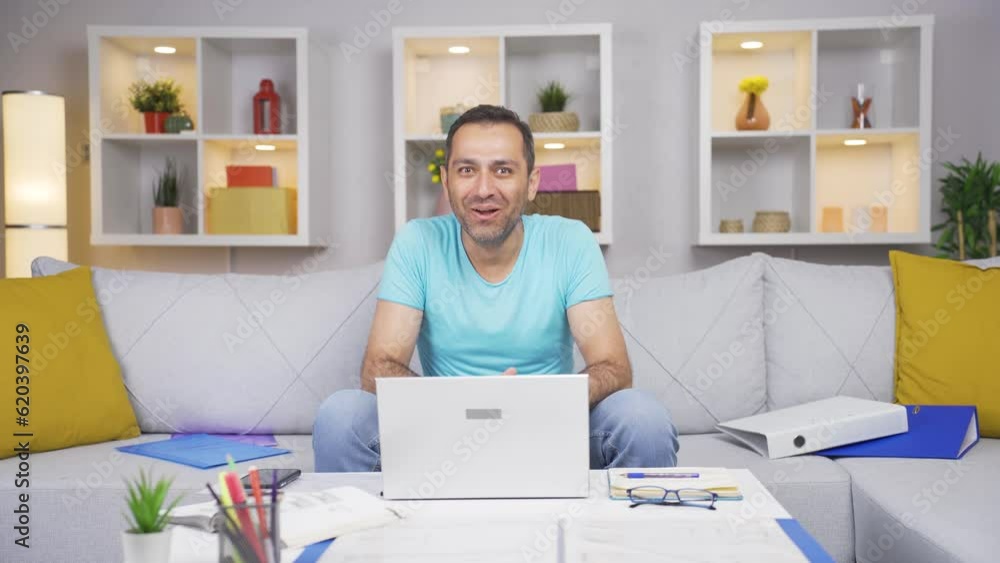 Home office worker man says wow to camera. Home office worker man says wow to camera.