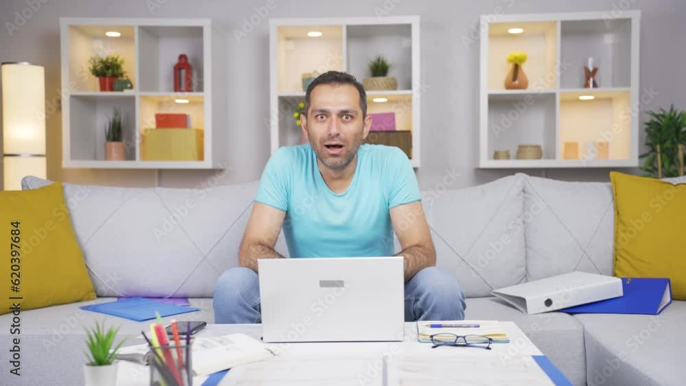 Home office worker man looking at camera confused. Home office worker man looking at camera confused.