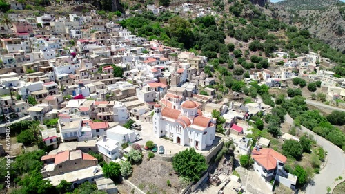 Aerial view of St. George church in Kritsa from Crete, Greece. Orbit shot of the church. photo