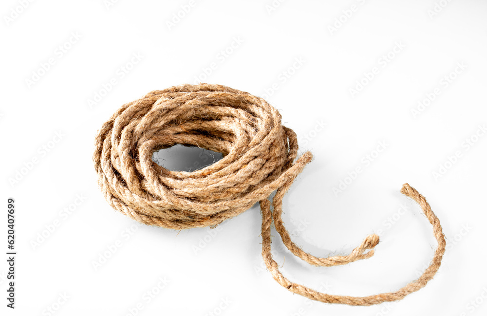 Skein of textured rope yarn on white background with shadows
