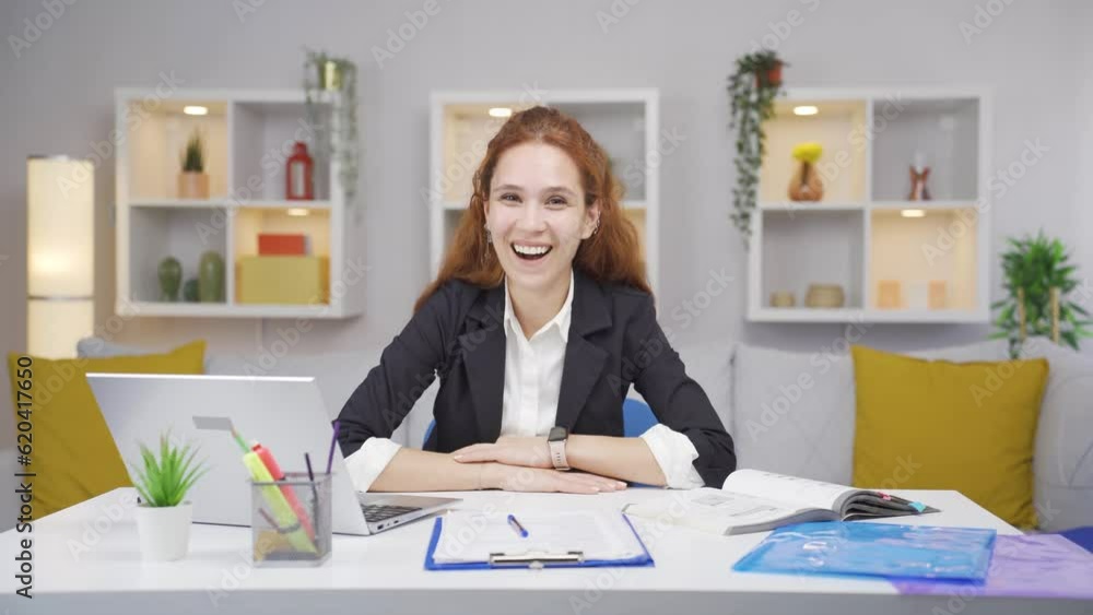 Home office worker woman says wow to camera.