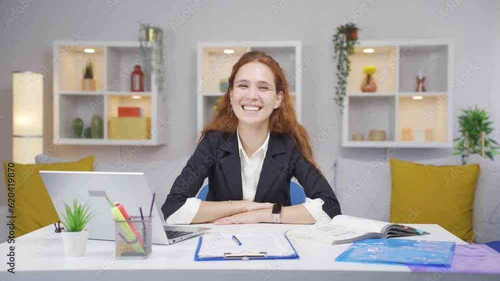 Home office worker woman winks at camera. Home office worker woman winks at camera.