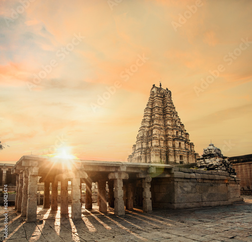 sunset at Virupaksha Temple, ruins of ancient city Vijayanagar at Hampi, the ancient city of Vijayanagar Hampi, Karnataka, India, UNESCO World Heritage Site. photo