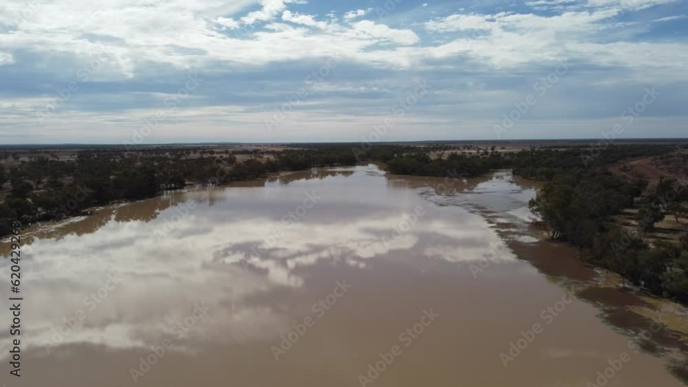 Drone flying over an Outback Lake in Australia, clouds reflecting over the Lake. Drone flying over an Outback Lake in Australia, clouds reflecting over the Lake.
