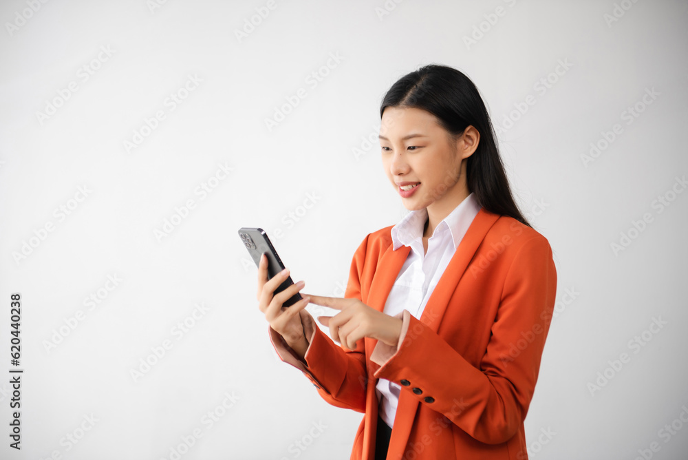 Portrait photo of young beautiful Asian woman feeling happy and holding smart phone, tablet and laptop with black empty screen on white background can use for advertising or product concept.. Portrait photo of young beautiful Asian woman feeling happy and holding smart phone, tablet and laptop with black empty screen on white background can use for advertising or product concept..