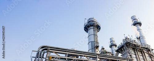 Fotografie, Obraz Power station clean modern factory Petroleum petrochemical industry building out