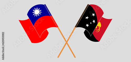 Crossed and waving flags of Taiwan and Papua New Guinea